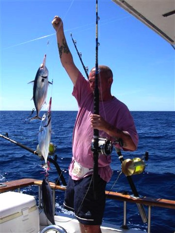 Robert and a string of skipjack tuna Robert and a string of skipjack tuna